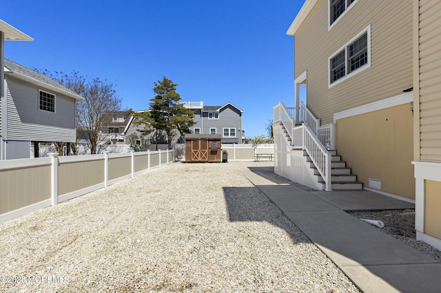 305 W 18th St, Ship Bottom, NJ 08008 - fenced backyard featuring stairway and a residential view
