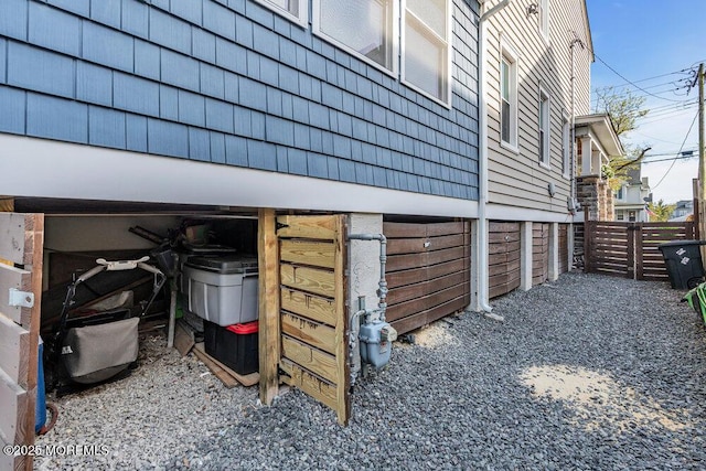 view of side of property with fence