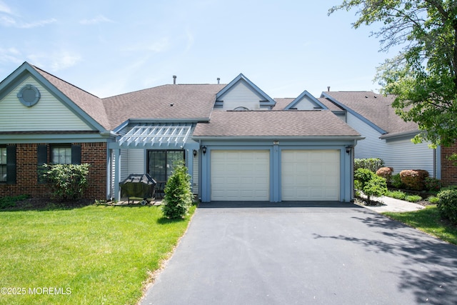 97 Gimbel Pl Unit 1903, Ocean Twp, NJ 07712 - view of front facade with a garage, driveway, a front lawn, a shingled roof, and brick siding