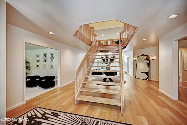 15 Evan Dr, Morganville, NJ 07751 - staircase featuring wood finished floors, recessed lighting, and baseboards