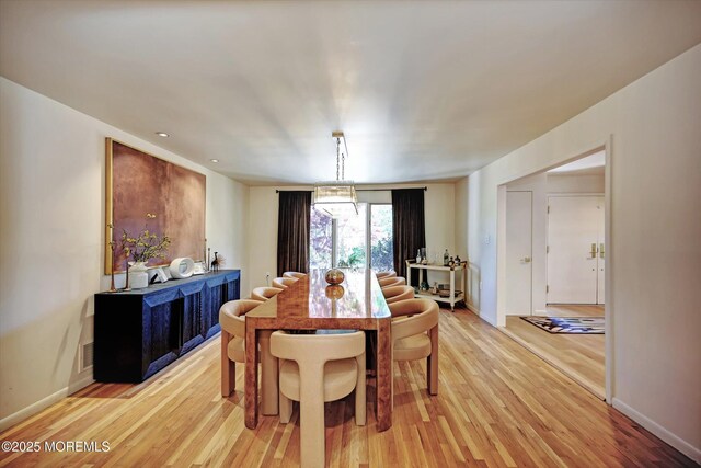 15 Evan Dr, Morganville, NJ 07751 - dining area featuring light wood finished floors and baseboards