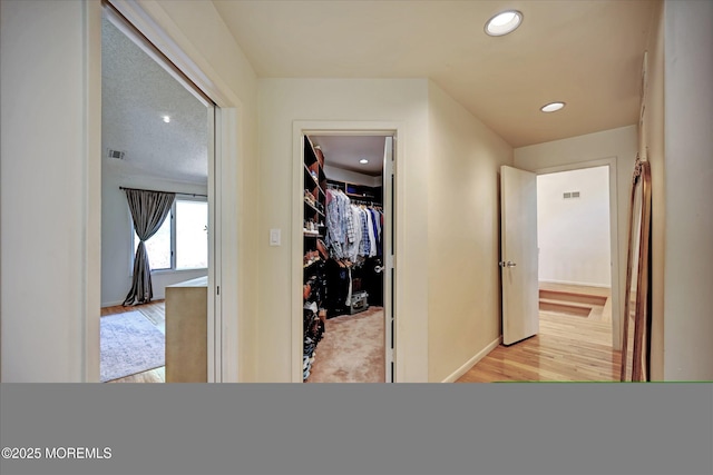 15 Evan Dr, Morganville, NJ 07751 - corridor with recessed lighting, light wood finished floors, and baseboards