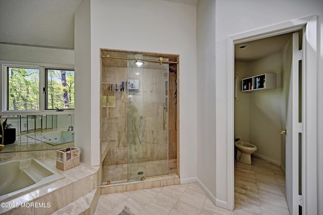 15 Evan Dr, Morganville, NJ 07751 - full bathroom featuring a stall shower, a bath, baseboards, a bidet, and tile patterned flooring