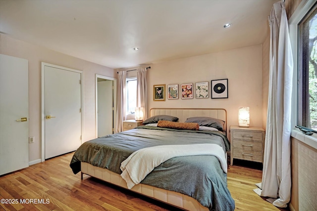 15 Evan Dr, Morganville, NJ 07751 - bedroom with multiple windows, light wood-style floors, recessed lighting, and baseboards