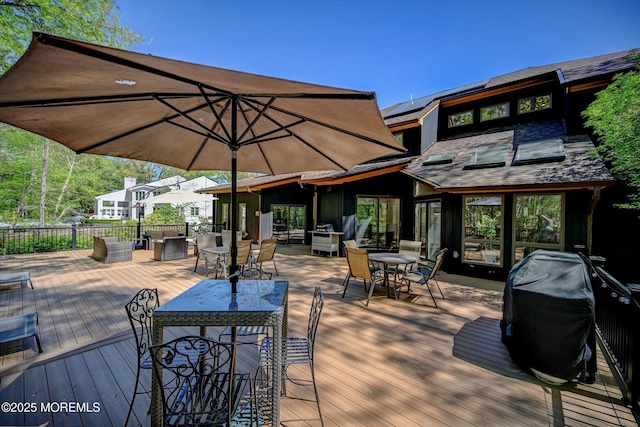 15 Evan Dr, Morganville, NJ 07751 - wooden terrace with outdoor dining space and area for grilling