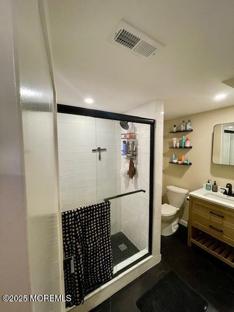 15 Evan Dr, Morganville, NJ 07751 - bathroom with a stall shower, toilet, vanity, and recessed lighting
