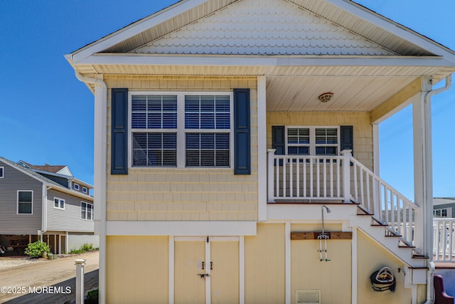 view of front of house featuring stairs