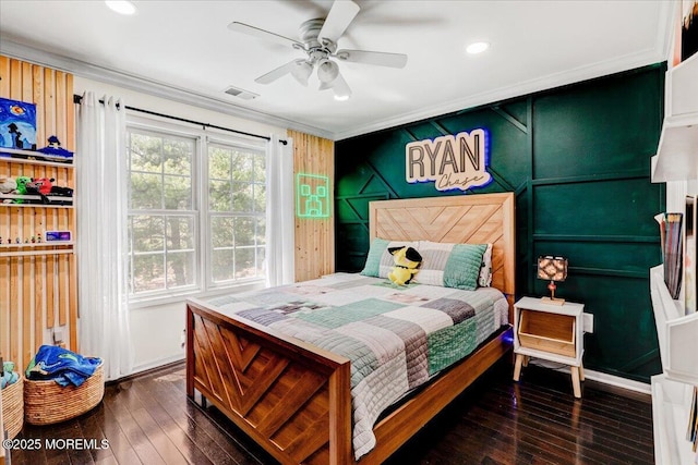 bedroom with crown molding, recessed lighting, visible vents, and dark wood-style floors