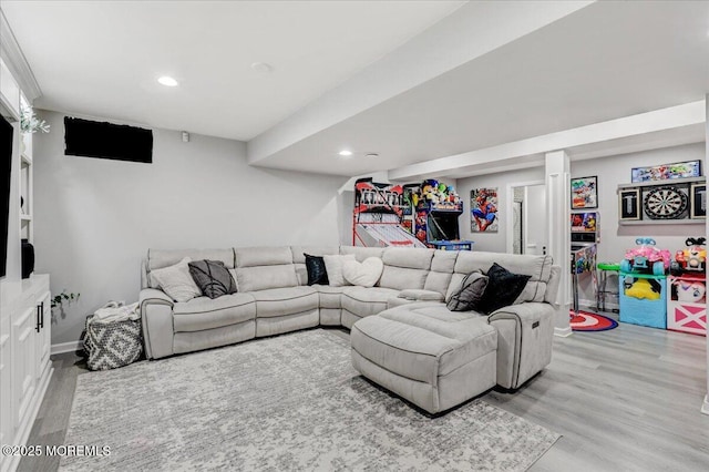 living room featuring recessed lighting and light wood-style flooring