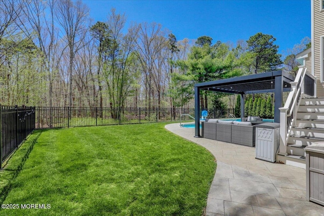 view of yard featuring a fenced backyard, a fenced in pool, a patio, and outdoor lounge area