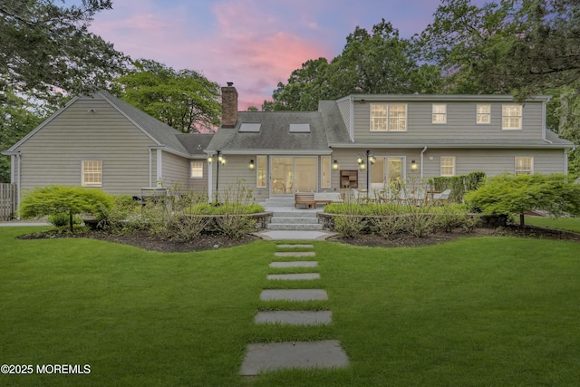1570 Beaver Hollow Dr, Toms River, NJ 08755 - view of front of house featuring a lawn and a chimney