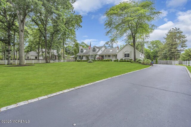 1570 Beaver Hollow Dr, Toms River, NJ 08755 - view of front of home with fence and a front yard