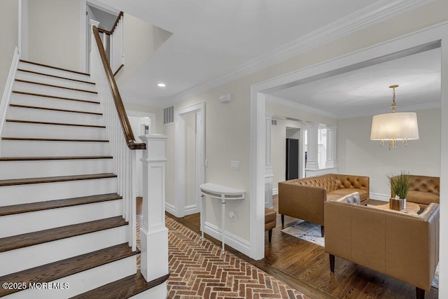 1570 Beaver Hollow Dr, Toms River, NJ 08755 - stairs featuring crown molding, brick floor, recessed lighting, baseboards, and visible vents