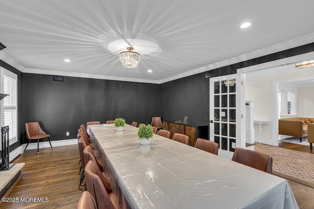 1570 Beaver Hollow Dr, Toms River, NJ 08755 - dining area with ornamental molding, dark wood-style flooring, baseboards, recessed lighting, and a notable chandelier