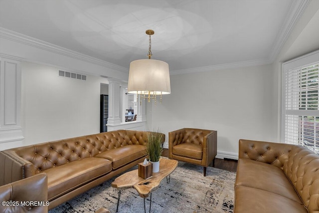 1570 Beaver Hollow Dr, Toms River, NJ 08755 - living area featuring ornate columns, visible vents, ornamental molding, and wood finished floors