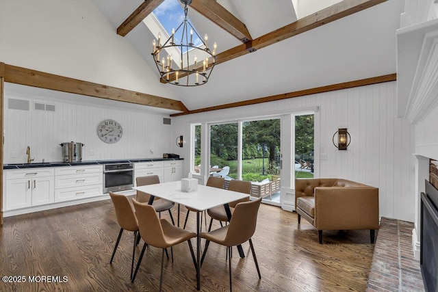 1570 Beaver Hollow Dr, Toms River, NJ 08755 - dining area featuring beamed ceiling, a chandelier, high vaulted ceiling, and dark wood finished floors