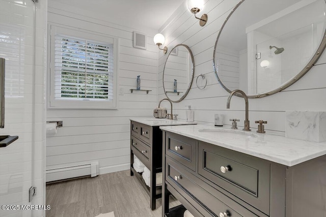 1570 Beaver Hollow Dr, Toms River, NJ 08755 - full bathroom with vanity, baseboards, walk in shower, baseboard heating, and wooden walls
