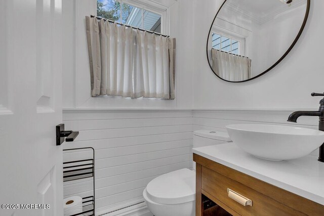 1570 Beaver Hollow Dr, Toms River, NJ 08755 - bathroom featuring toilet, ornamental molding, a wealth of natural light, and vanity