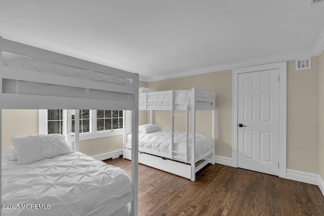 1570 Beaver Hollow Dr, Toms River, NJ 08755 - bedroom featuring baseboards, visible vents, ornamental molding, and wood finished floors