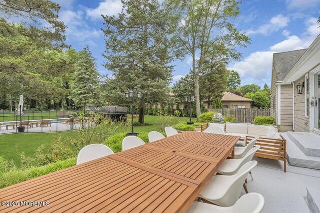 1570 Beaver Hollow Dr, Toms River, NJ 08755 - view of patio featuring outdoor dining area, a fenced backyard, and a fenced in pool