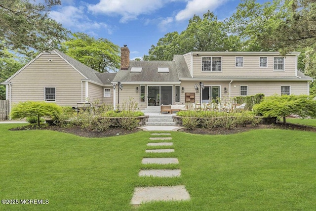 1570 Beaver Hollow Dr, Toms River, NJ 08755 - back of property featuring a lawn, a patio, and a chimney