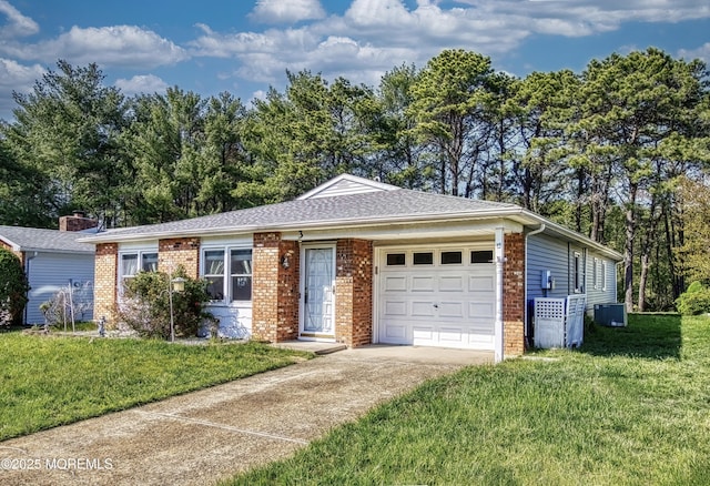 3 Tudor Ct, Brick, NJ 08723 - ranch-style home with brick siding, an attached garage, driveway, and a front lawn