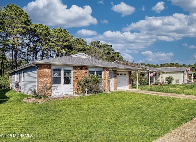 3 Tudor Ct, Brick, NJ 08723 - ranch-style home featuring an attached garage, concrete driveway, brick siding, and a front yard