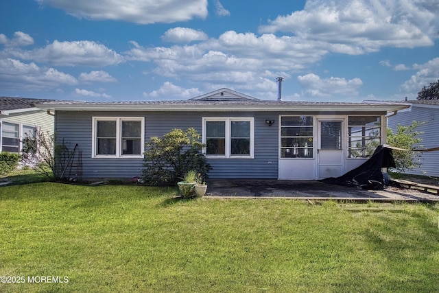 3 Tudor Ct, Brick, NJ 08723 - rear view of property with a lawn and a patio