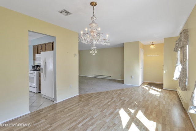 3 Tudor Ct, Brick, NJ 08723 - interior space featuring a baseboard radiator, light wood finished floors, a chandelier, and visible vents