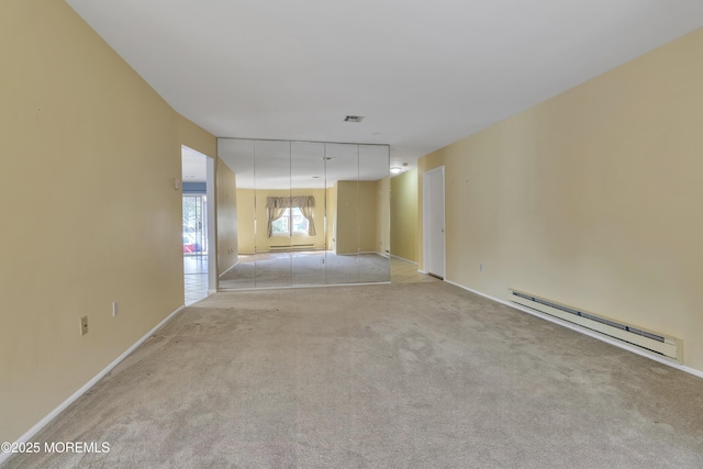 3 Tudor Ct, Brick, NJ 08723 - empty room with carpet floors, baseboards, a baseboard heating unit, and visible vents