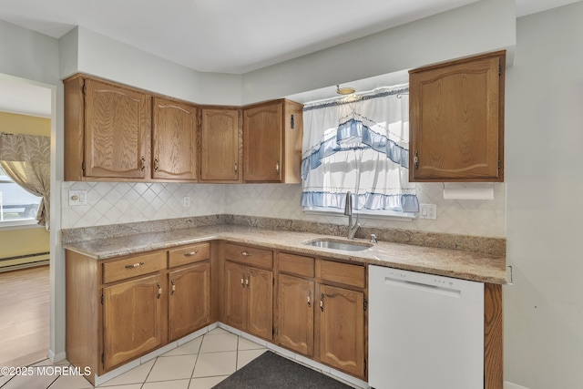 3 Tudor Ct, Brick, NJ 08723 - kitchen featuring light countertops, brown cabinetry, a sink, and dishwasher