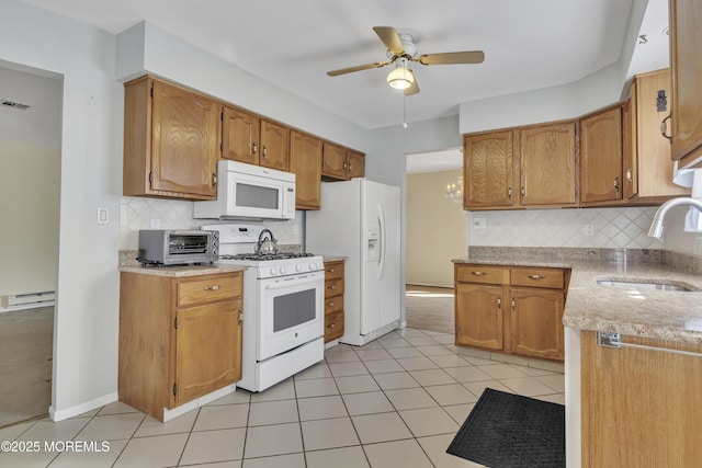 3 Tudor Ct, Brick, NJ 08723 - kitchen featuring a toaster, white appliances, ceiling fan, tasteful backsplash, and a sink
