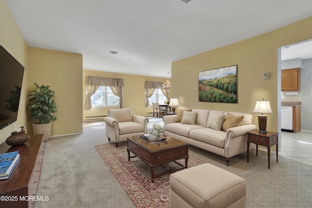 3 Tudor Ct, Brick, NJ 08723 - living area featuring visible vents, baseboards, a baseboard radiator, an inviting chandelier, and light carpet