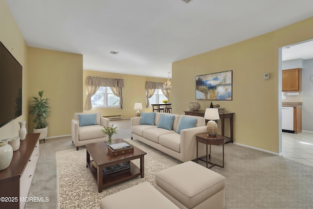 3 Tudor Ct, Brick, NJ 08723 - living area featuring visible vents, baseboards, a chandelier, and light carpet