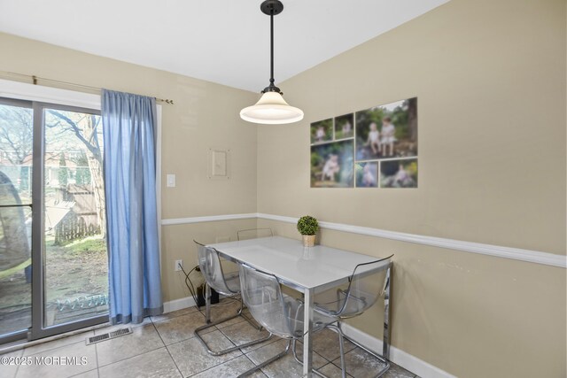 162 Tudor Ct, Lakewood, NJ 08701 - dining room with baseboards, visible vents, and tile patterned flooring