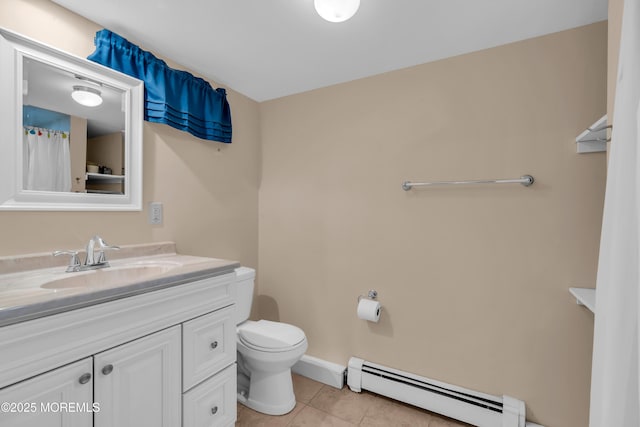 full bath featuring baseboard heating, tile patterned flooring, toilet, and vanity