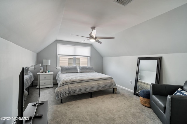 bedroom featuring ceiling fan, visible vents, vaulted ceiling, carpet floors, and baseboards