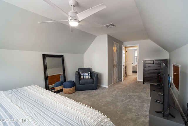 carpeted bedroom with baseboards, visible vents, ceiling fan, and vaulted ceiling