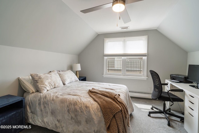 carpeted bedroom with a baseboard heating unit, ceiling fan, vaulted ceiling, and visible vents