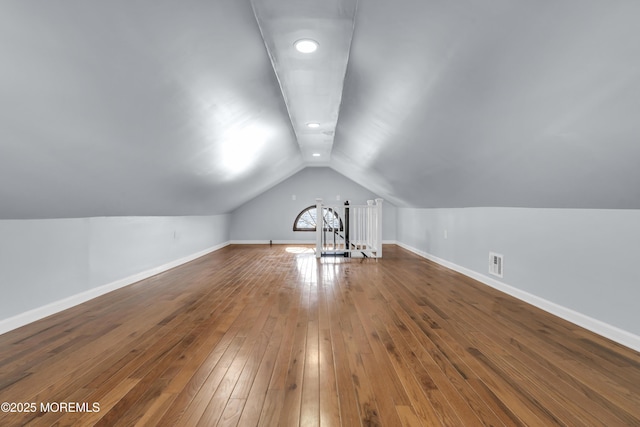 191 State Route 35, Red Bank, NJ 07701 - additional living space with wood-type flooring, baseboards, visible vents, and lofted ceiling