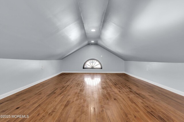 191 State Route 35, Red Bank, NJ 07701 - additional living space featuring baseboards, vaulted ceiling, and hardwood / wood-style flooring
