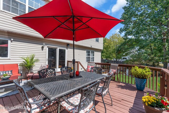 deck featuring outdoor dining space
