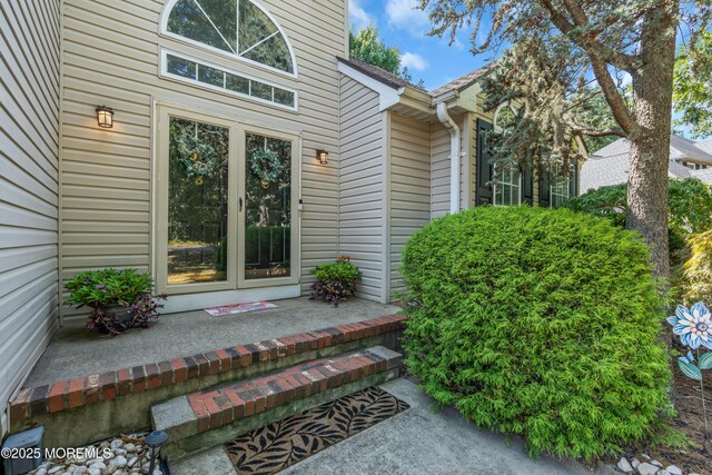 doorway to property with french doors