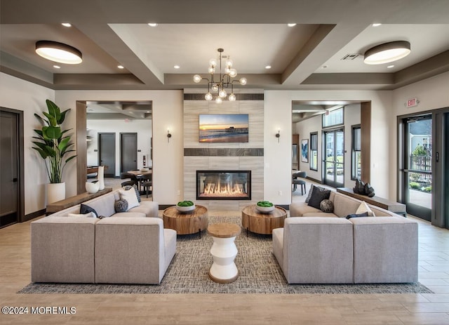 103 Wisteria Ct, Freehold, NJ 07728 - living area with visible vents, beamed ceiling, recessed lighting, a high end fireplace, and a chandelier