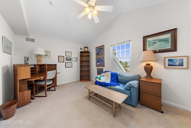 office with a ceiling fan, baseboards, light colored carpet, and lofted ceiling