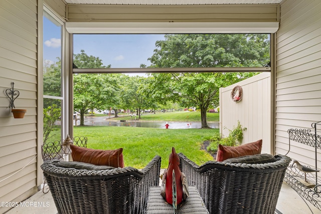 view of patio / terrace with a water view