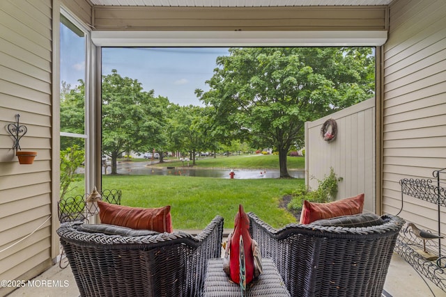 view of patio / terrace featuring a water view