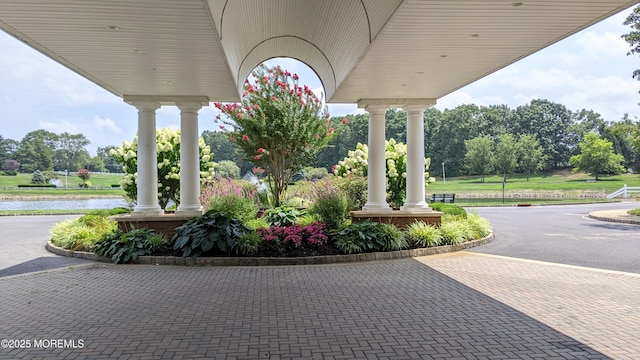 view of property's community with a water view