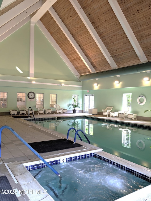 pool with an indoor hot tub
