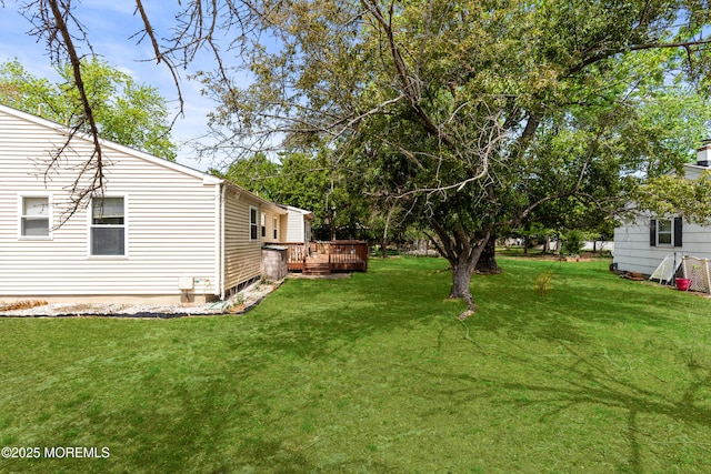 view of yard with a deck